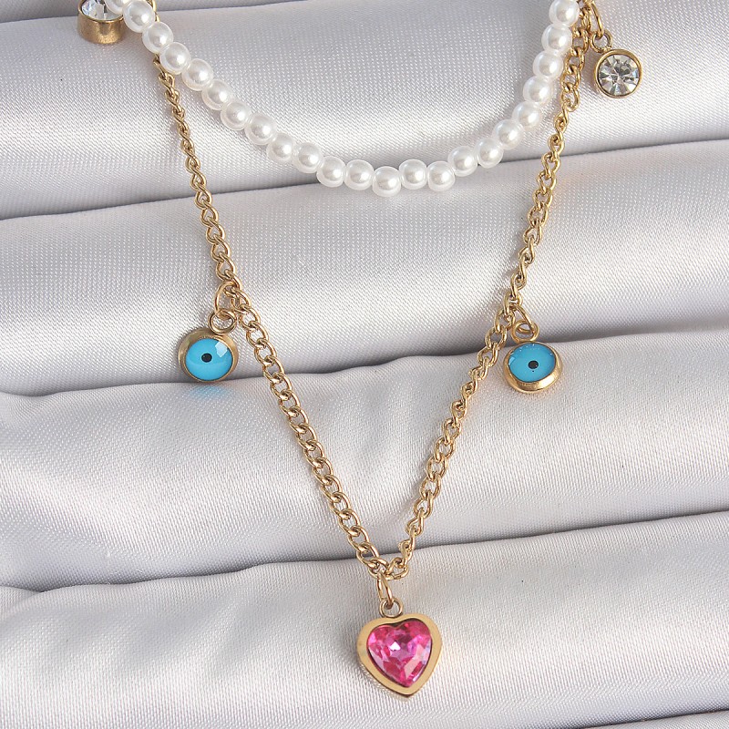 316L Çelik Gold Renk 2'Li İnci Zincir Model Pembe Taşlı Kalp Figür Nazar Boncuk Detay Kadın Kolye