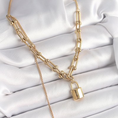 316L Çelik Gold Renk Tiffany Zincir Model Kilit Figür Sallantı İnci Detay Kadın Kolye