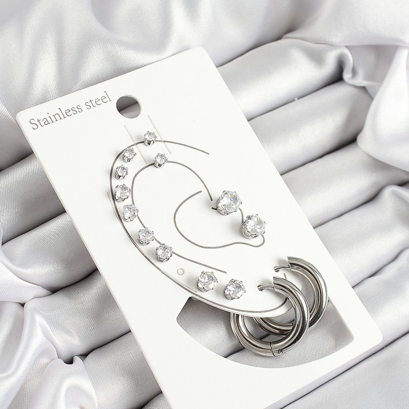 316L Çelik Halka Figürlü Ve Zirkon Taşlı Gümüş Renk 7'li Çift Kadın Küpe Set