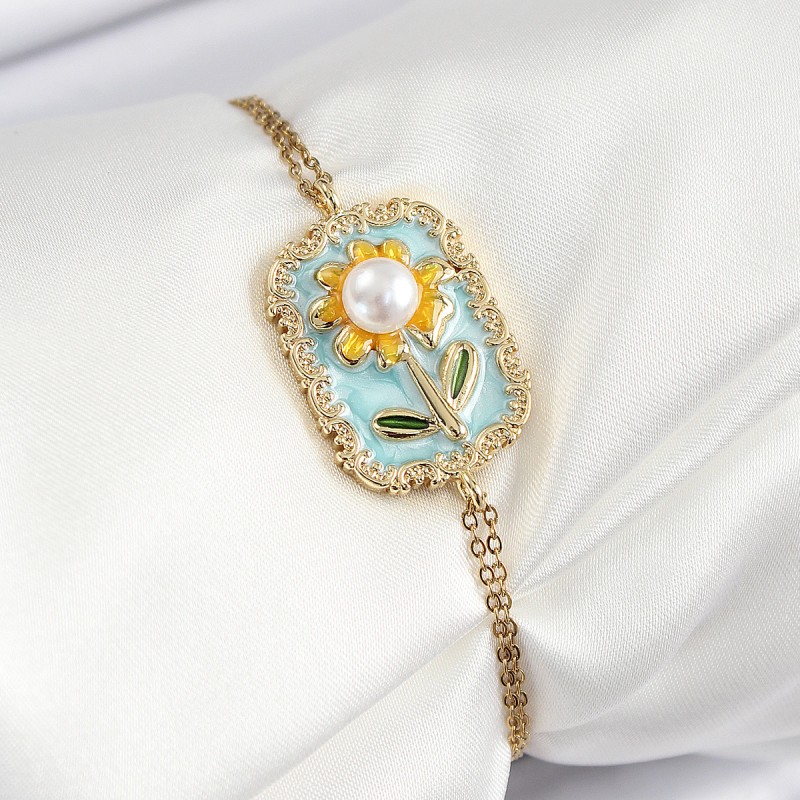 316L Çelik Zincir Turkuaz Mineli Sanatsal Portre İnci Detaylı Papatya Model Gold Renk Kadın Bileklik