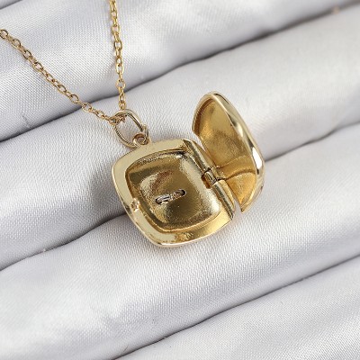 316L Çelik Zirkon Taşlı Açılabilr Kapaklı Göz Model Gold Renk Kadın Kolye