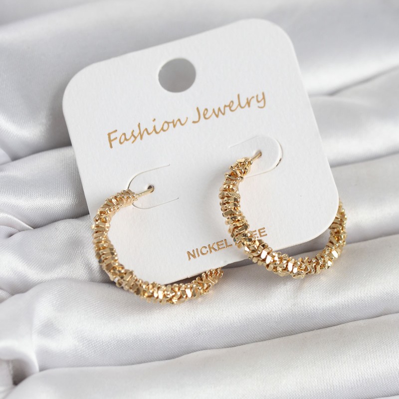 Gold Renk Pirinç Tırtık Model Kadın Küpe