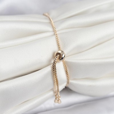 Gold Renk Zirkon Taşlı Sıralı Damla Model Asansörlü Kadın Bileklik