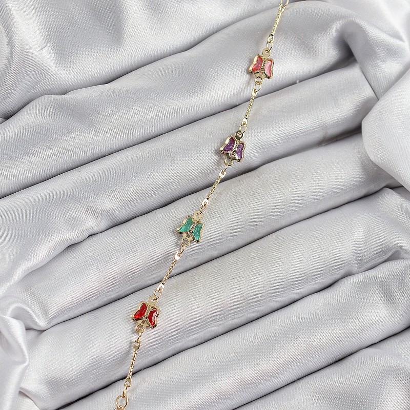 Pirinç Gold Renk Karışık Kelebek Zirkon Taşlı Kadın Bileklik