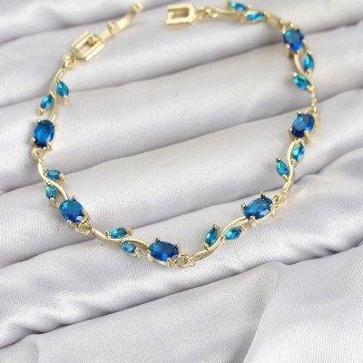 Pirinç Gold Renk Mavi Zirkon Taşlı Çiçek Model Kadın Bileklik
