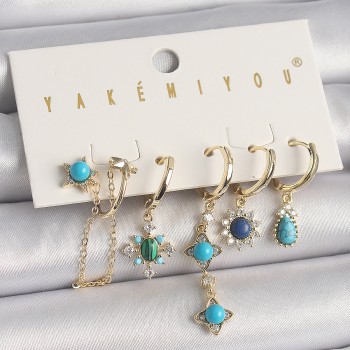 Pirinç Gold Renk Zirkon Taşlı Mavi Boncuklu Çiçek Model VIP Seri Kadın Küpe Kombini