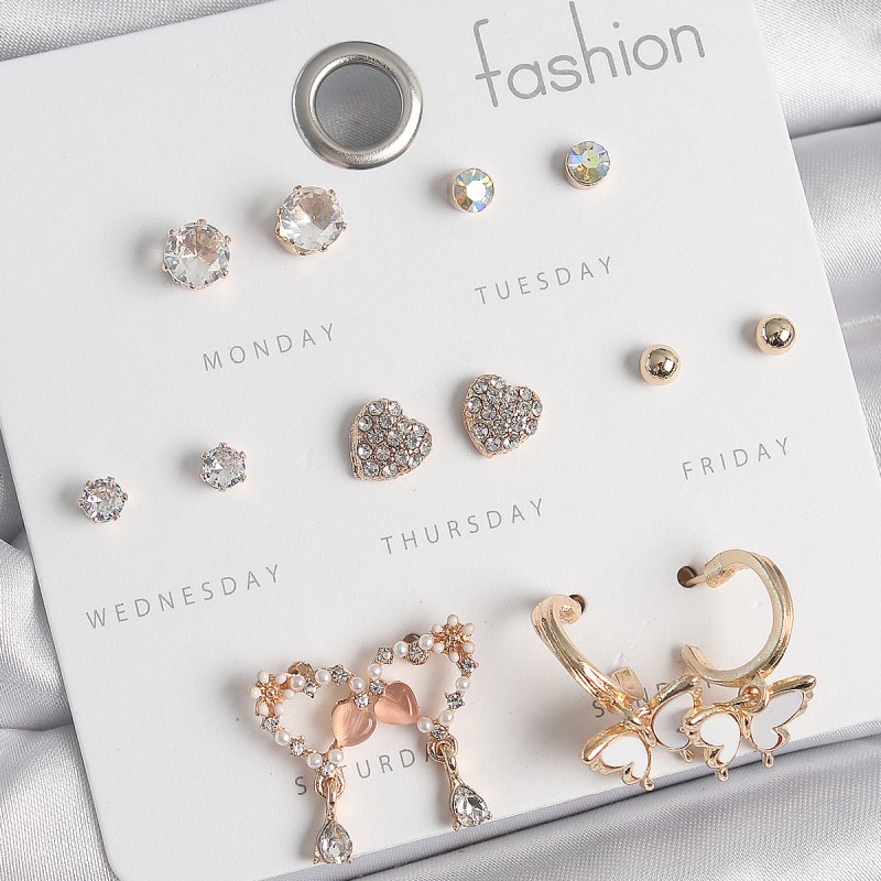 Pirinç Gold Renk Zirkon Taşlı Sallantılı Kalp Figür Kelebek Detay 7 Çift Kadın Küpe Seti