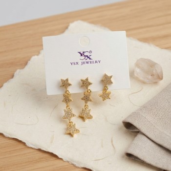 Pirinç Gold Renk Zirkon Taşlı Sallantılı Yıldız Model Kadın Küpe Seti