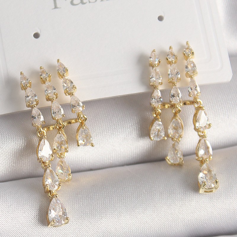 Pirinç Gold Renk Zirkon Taşlı Yağmur Model Kadın Küpe