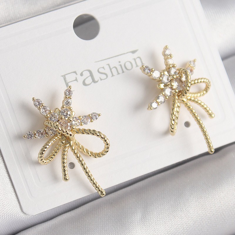 Pirinç Gold Renk Zirkon Taşlı Yıldız Düğüm Model Kadın Küpe