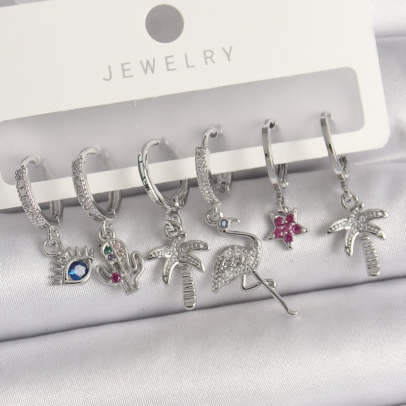 Pirinç Gümüş Renk Sallantı Zirkon Taşlı Deve Kuşu Figür Çoklu Kadın Küpe Seti