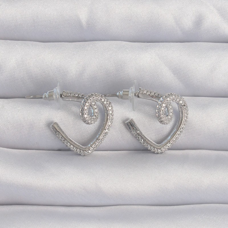 Pirinç Gümüş Renk Zirkon Taşlı Kıvrımlı Yarım Kalp Küpe