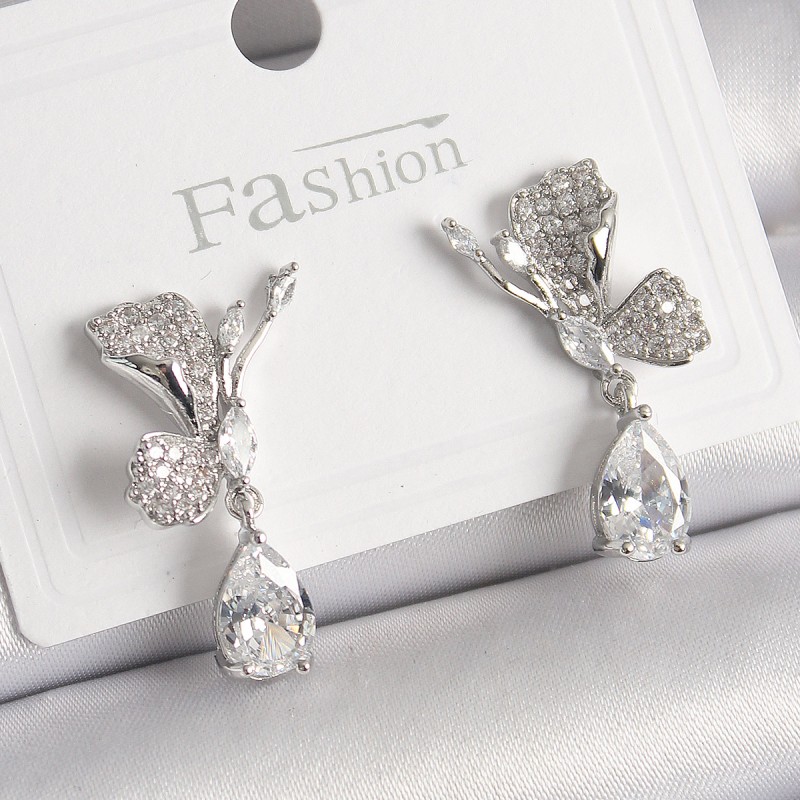 Pirinç Gümüş Renk Zirkon Taşlı Turna Kuşu Model Sallantı Detay Kadın Küpe