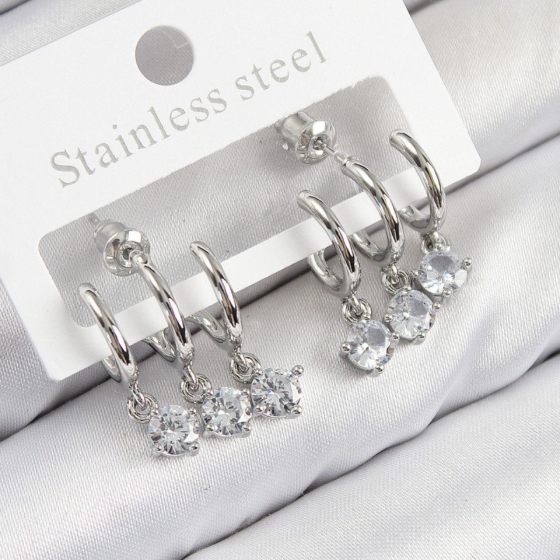 Pirinç Sallantılı Zirkon Taşlı Model Gümüş Renk Kadın Küpe