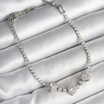 Pirinç Sıralı Kalp Figürlü Zirkon Taşlı Gümüş Renk Kadın Bileklik