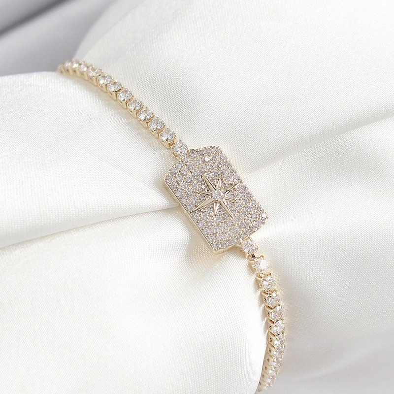 Pirinç Zirkon Taşlı Kutup Yıldızı Model Gold Renk Asansörlü Kadın Bileklik