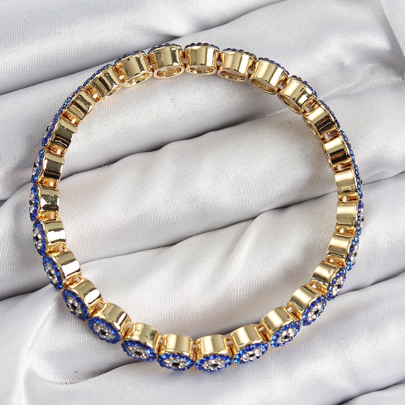 Pirinç Zirkon Taşlı Lacivert Nazar Model Gold Renk Lastikli Kadın Bileklik